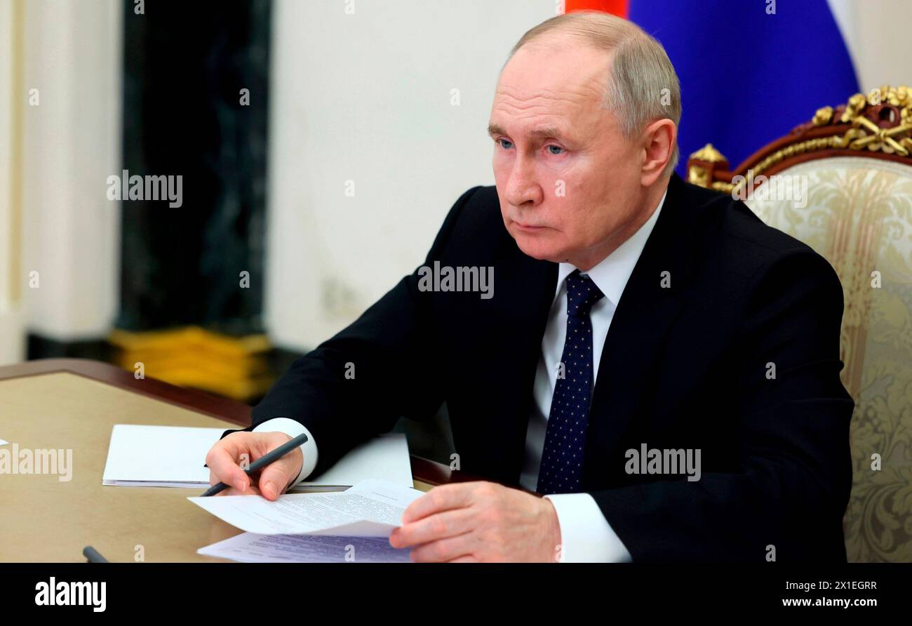 Moscow, Russia. 15th Apr, 2024. Russian President Vladimir Putin hosts a remote meeting via video conference with the Astrakhan Region Governor Igor Babushkin from the Kremlin, April 15, 2024 in Moscow, Russia. Credit: Gavriil Grigorov/Kremlin Pool/Alamy Live News Stock Photo