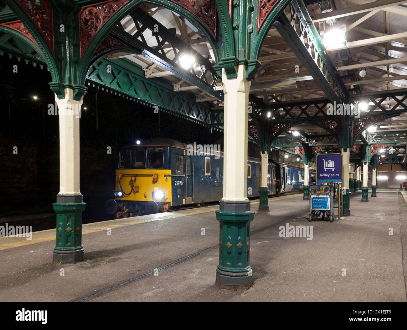 GB railfreight class 73 locomotive at Edinburgh Waverley  waiting with 0439 Edinburgh - Aberdeen portion of 2115 Caledonian sleeper from London Euston Stock Photo