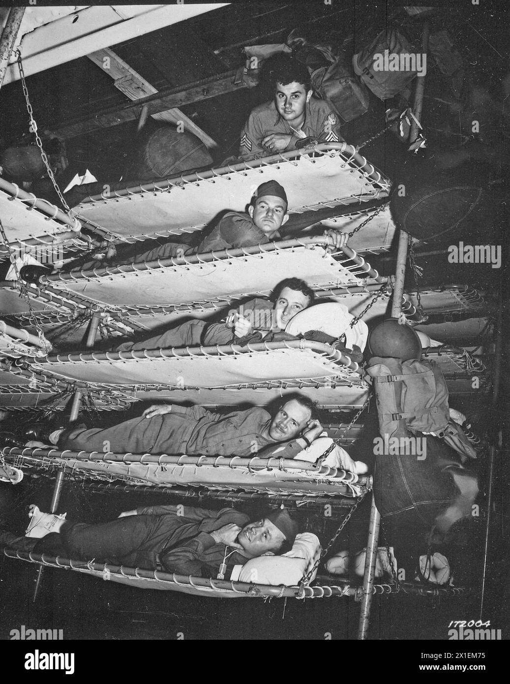 Soldiers in bunks on Army transport, S.S. Pennant, Port of Embarkation, San Francisco, California, November 1, 1942 Stock Photo