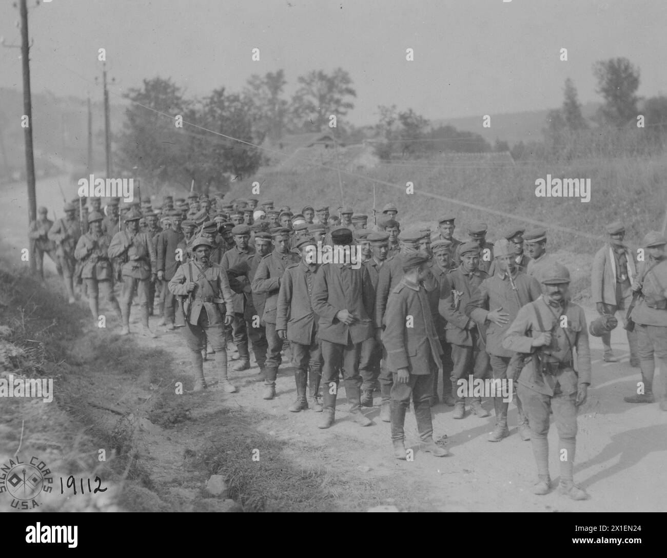 German prisoners being taken to the rear. Captured by the 110th regiment infantry, 28th division near Le Charmell, France ca. 1918 Stock Photo