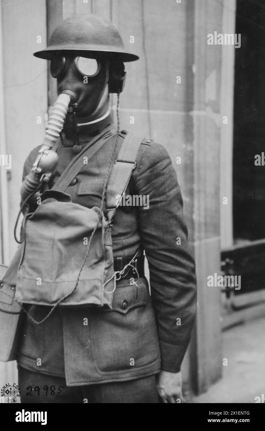 American soldier using a telephone gas mask transmitter ca. 1918 Stock Photo