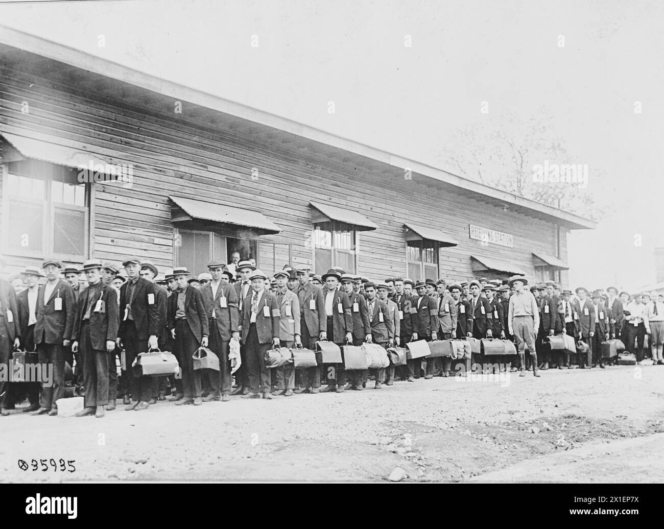 American men standing in line at a cantonement after being drafted into the army ca. 1917 Stock Photo