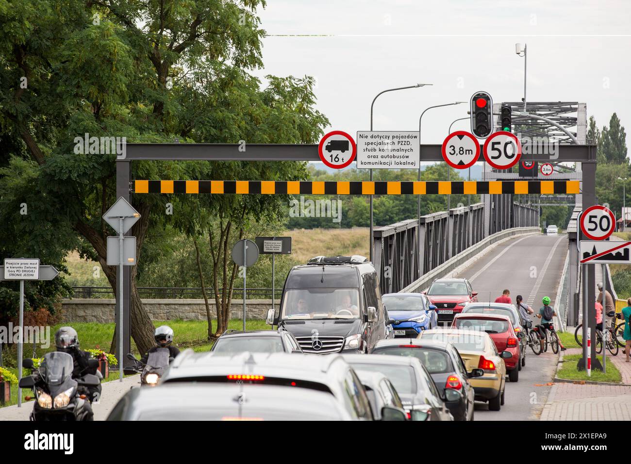 Cigacice, Poland. 12th Aug, 2023. Cars are seen waiting to cross the bridge over the Oder River. The Oder is a river in Central Europe. It is Poland's second-longest river in total length. The Oder rises in the Czech Republic and flows 741 kilometers through western Poland. The river is an important waterway, navigable throughout most of its length. It forms a link, by way of the Gliwice Canal, between the great industrialized areas of Silesia in southwestern Poland, and the trade routes of the Baltic Sea. (Credit Image: © Karol Serewis/SOPA Images via ZUMA Press Wire) EDITORIAL USAGE ONLY! N Stock Photo