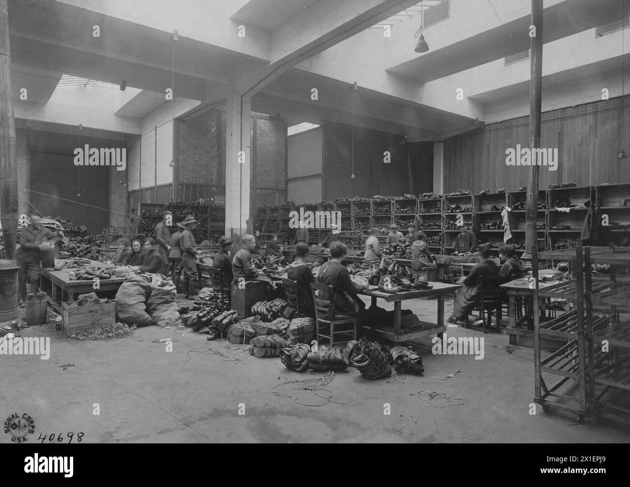 Shoe repairing depot in Tours Indre et Loire France where worn out shoes of the A.E.F. are repaired ca. 1918 Stock Photo