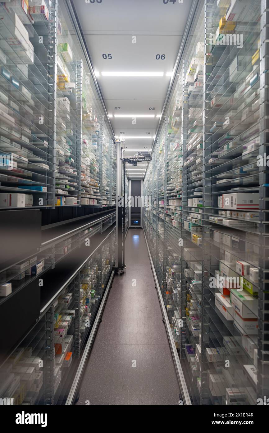 Photography of a pharmacy storage room and a robot hand are arranging ...