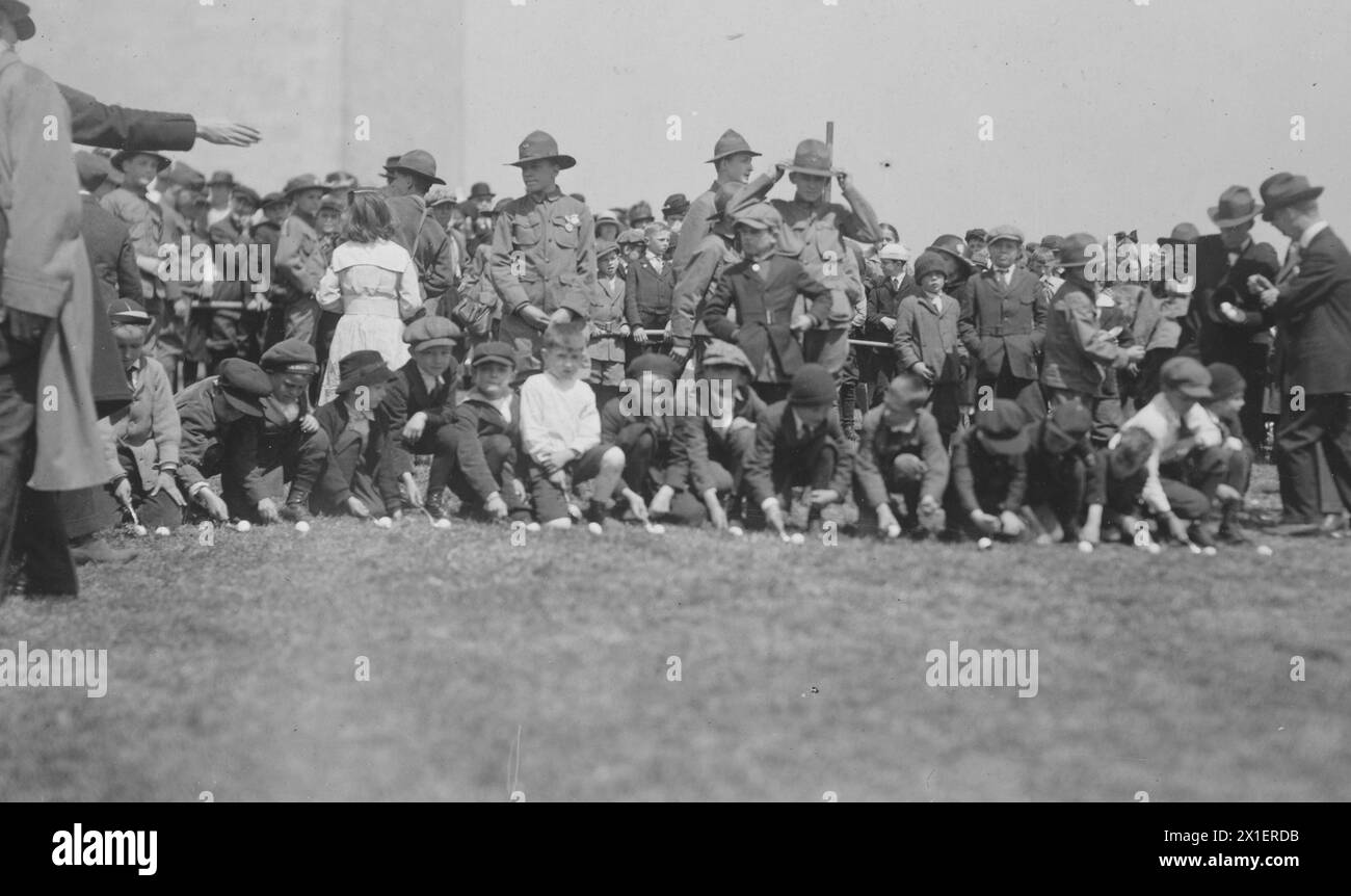 Boys awaiting signal to start race in the Easter egg rolling contest ca. April 1919 Stock Photo