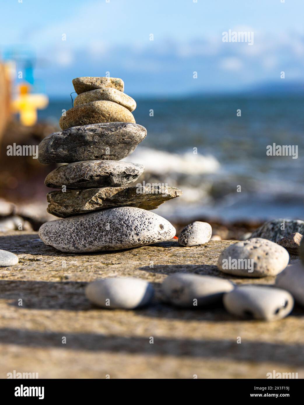 Small rock Cairn at Blackrock Diving Tower Stock Photo