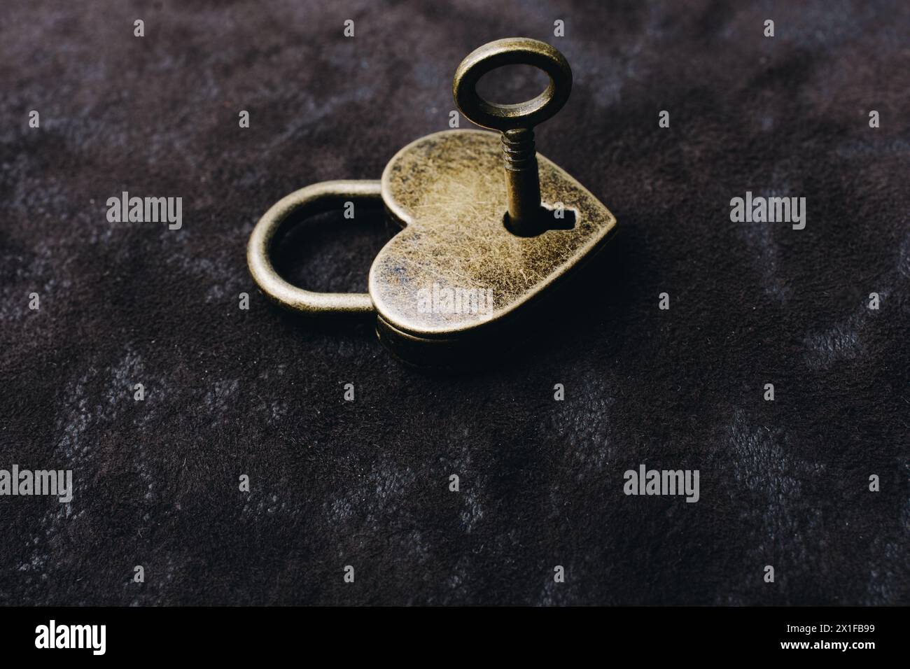 Metal padlock in heart shape as symbol of love Stock Photo - Alamy