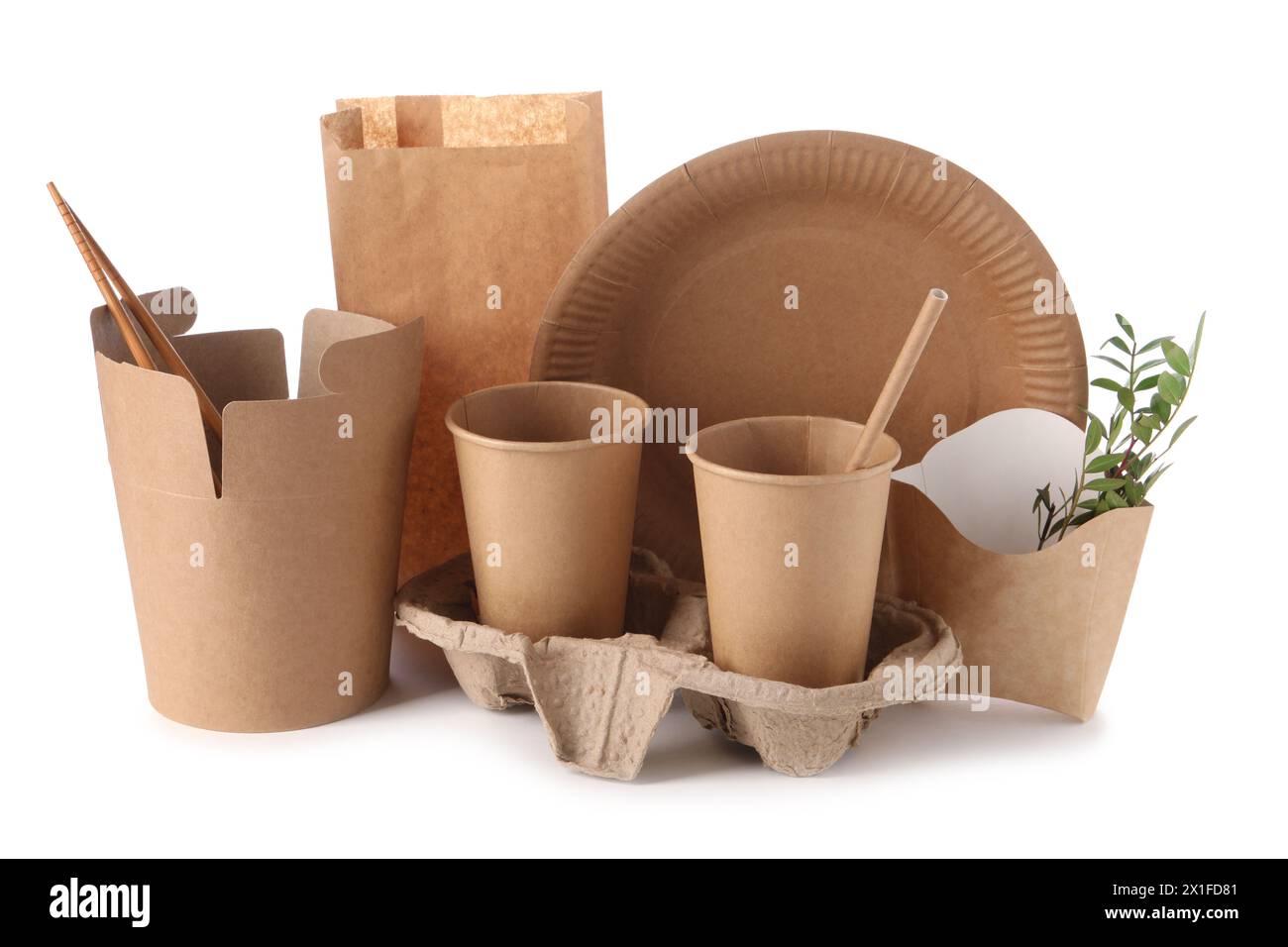 Eco friendly food packagings, tableware, paper bag and twigs isolated on white Stock Photo