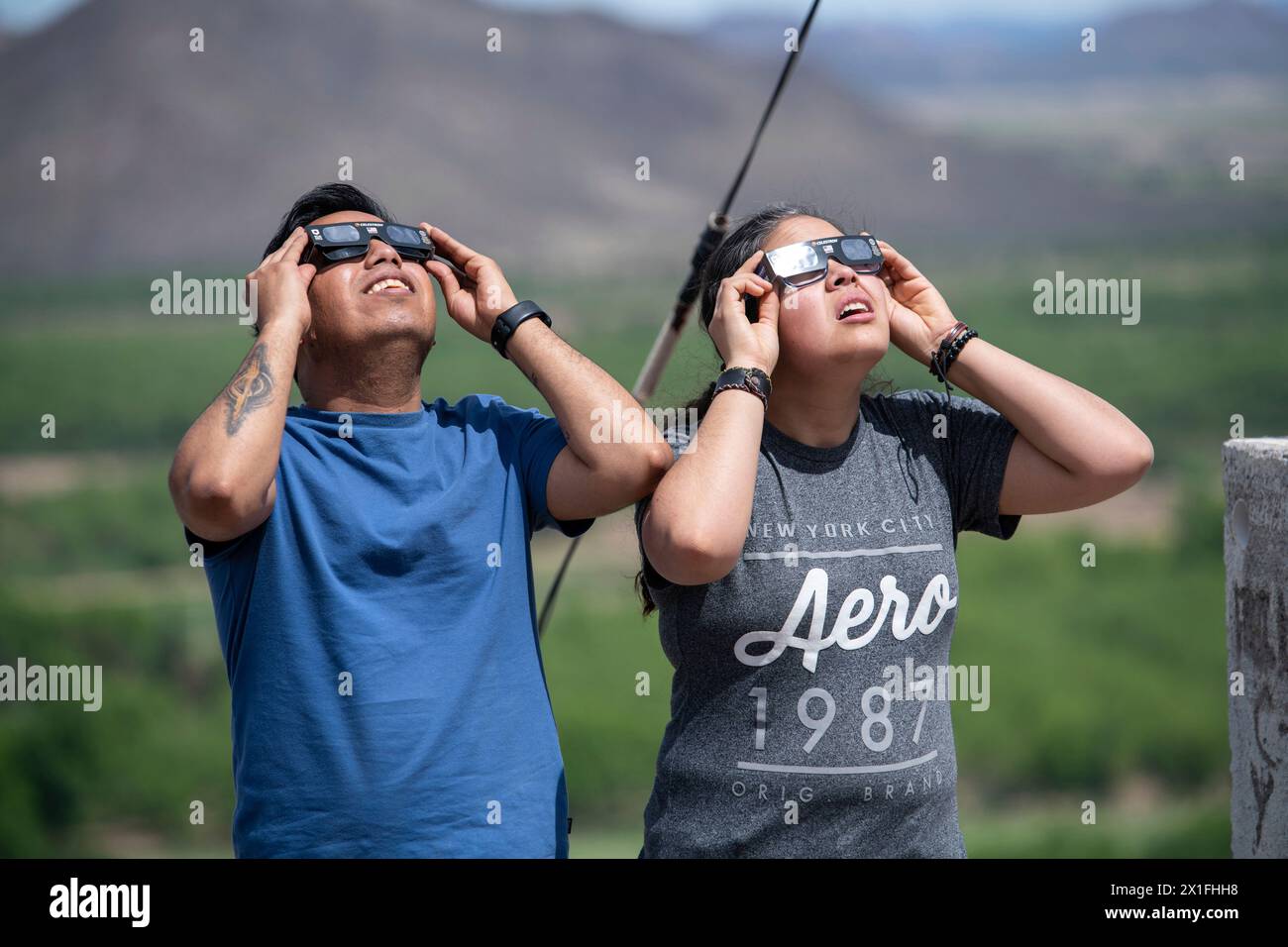 Editorial use only People watching the total solar eclipse of 8th April