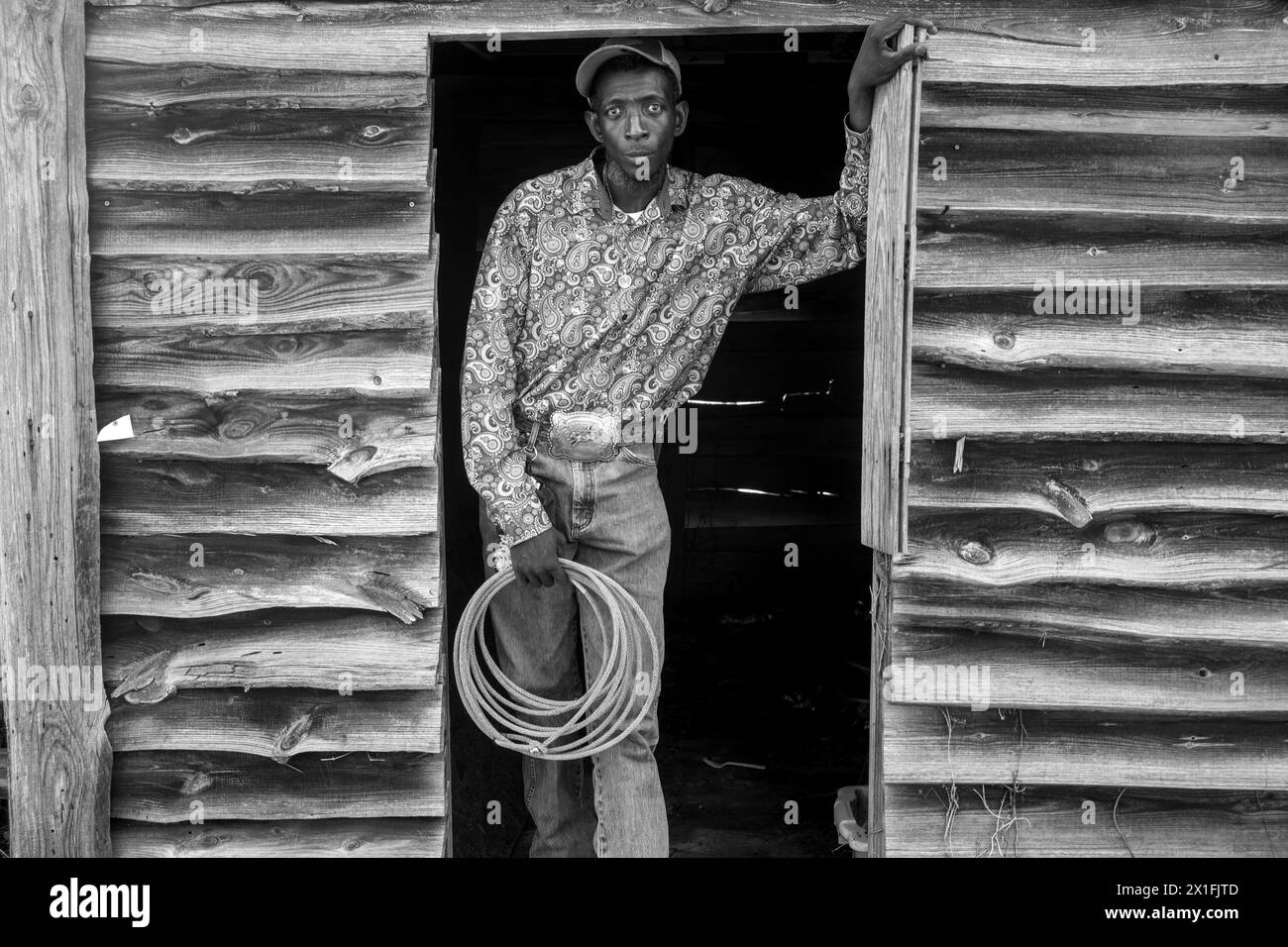 Shelby, North Carolina, USA. 18th Aug, 2023. 'Carolina Cowboy' with a rope in his hand at the arena during the third day of the Ebony Horseman trail ride. (Credit Image: © Brian Branch Price/ZUMA Press Wire) EDITORIAL USAGE ONLY! Not for Commercial USAGE! Stock Photo