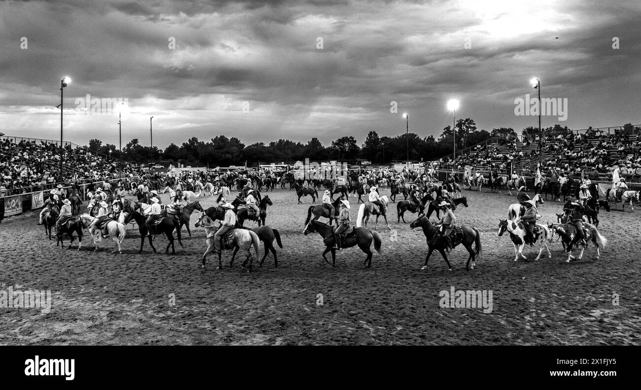 Okmulgee, Oklahoma, USA. 12th Aug, 2023. The Grand Entry during the 68th annual Roy Leblanc invitational rodeo qualifying times in Oklmulgee. The grand entry is open to all horseman with horses and snaking a line during opening ceremonies. The entry included nearly 500 horseman. (Credit Image: © Brian Branch Price/ZUMA Press Wire) EDITORIAL USAGE ONLY! Not for Commercial USAGE! Stock Photo