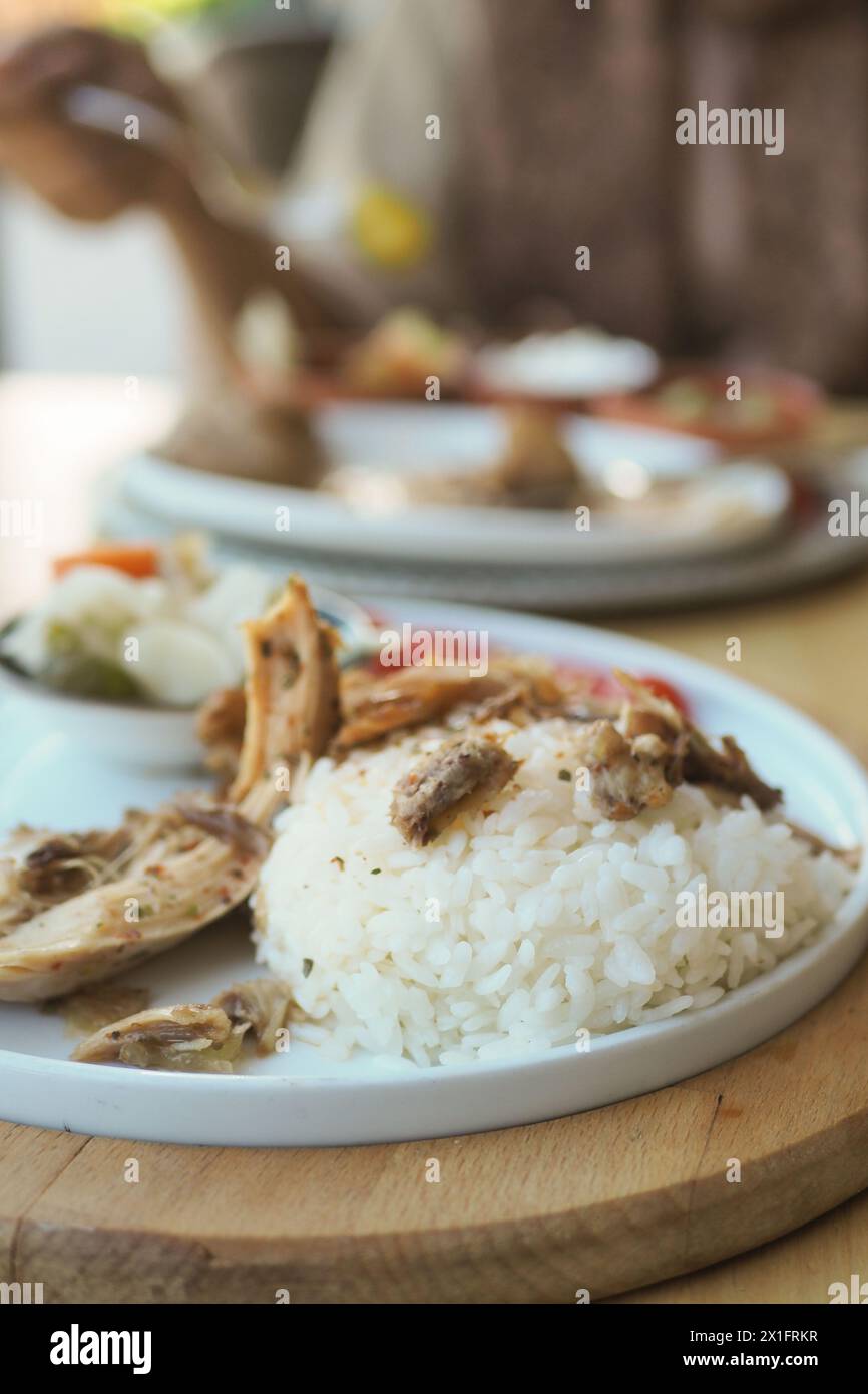 Boiled chicken, steamed rice, pink plate Stock Photo - Alamy