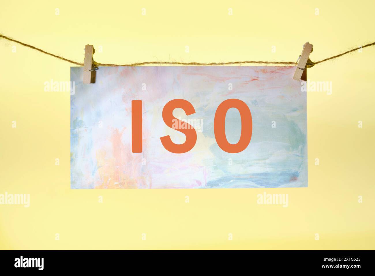 The concept of ISO quality control certification approval. Abbreviation ISO written on paper