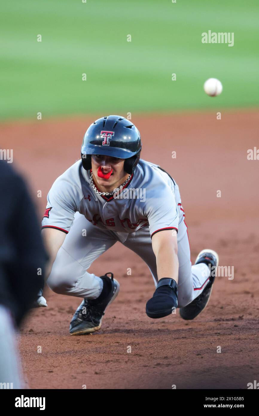 April 16, 2024: Dylan Maxcey #26 of Texas Tech prepares to slide face first into third base. Arkansas defeated Texas Tech 9-8 in Fayetteville, AR. Richey Miller/CSM Stock Photo