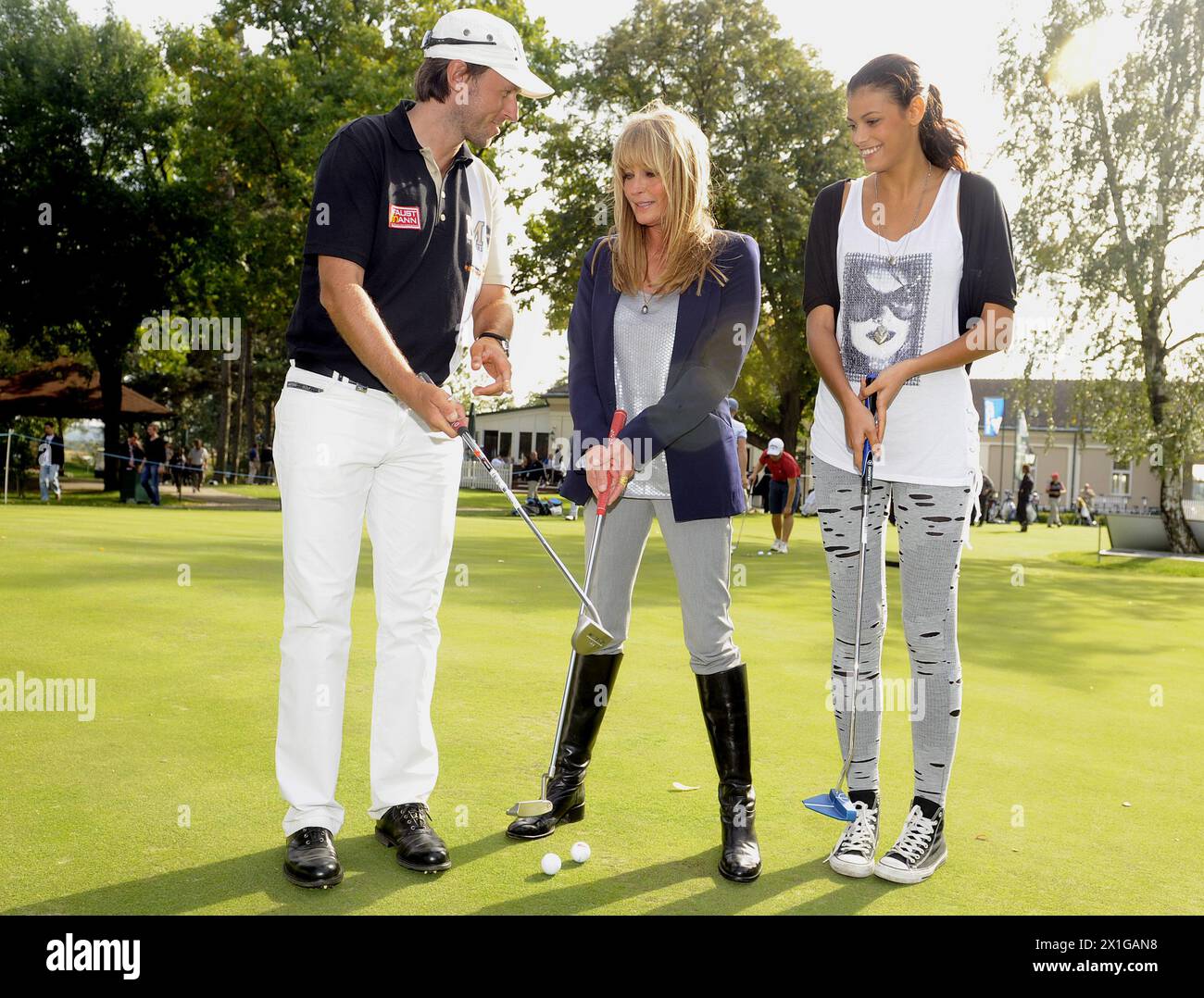 Press Conference on the Golf Austrian Open 2010 in Atzenbrugg. In the picture: from left to right:Martin Wiegele, Bo Derek, and Germany's next TopmodelAlisar Ailabouni on  14 September 2010. - 20100914 PD1165 - Rechteinfo: Rights Managed (RM) Stock Photo