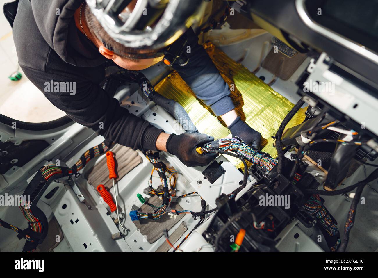 Process of installation car soundproofing material in car service Stock