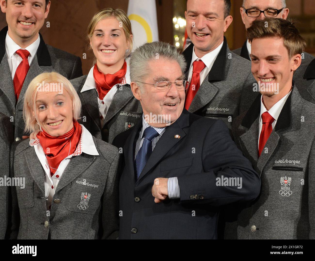 Ski jumper Daniela Iraschko-Stolz, federal president Heinz Fischer and ski jumper Gregor Schlierenzauer pose for photographs during the swearing-in ceremony of the Austrian team for the Sochi Olympic Winter Games at the Hofburg Palace in Vienna, Austria, 29 January 2014. - 20140129 PD1703 - Rechteinfo: Rights Managed (RM) Stock Photo