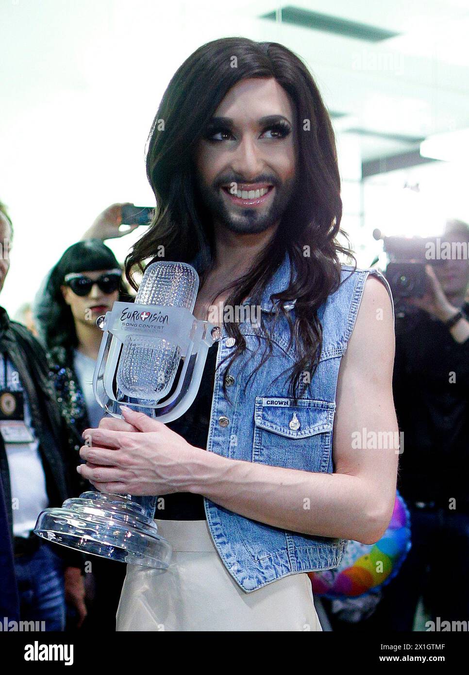EuroVision Song Contest 2014 winner Conchita Wurst posing for the media after her arrival at Vienna Schwechat airport on 11 May 2014. - 20140510 PD6341 - Rechteinfo: Rights Managed (RM) Stock Photo