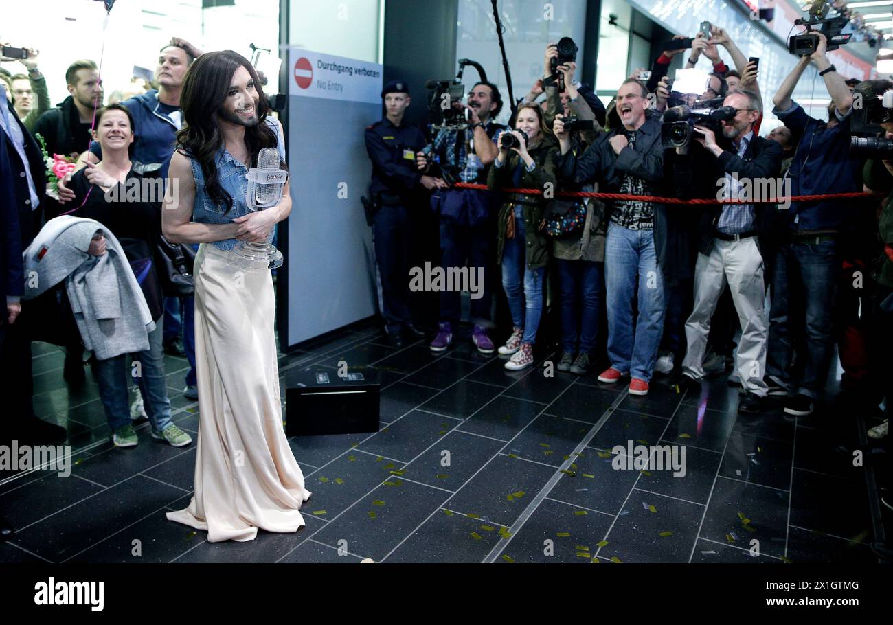 EuroVision Song Contest 2014 winner Conchita Wurst posing for the media after her arrival at Vienna Schwechat airport on 11 May 2014. - 20140510 PD6320 - Rechteinfo: Rights Managed (RM) Stock Photo