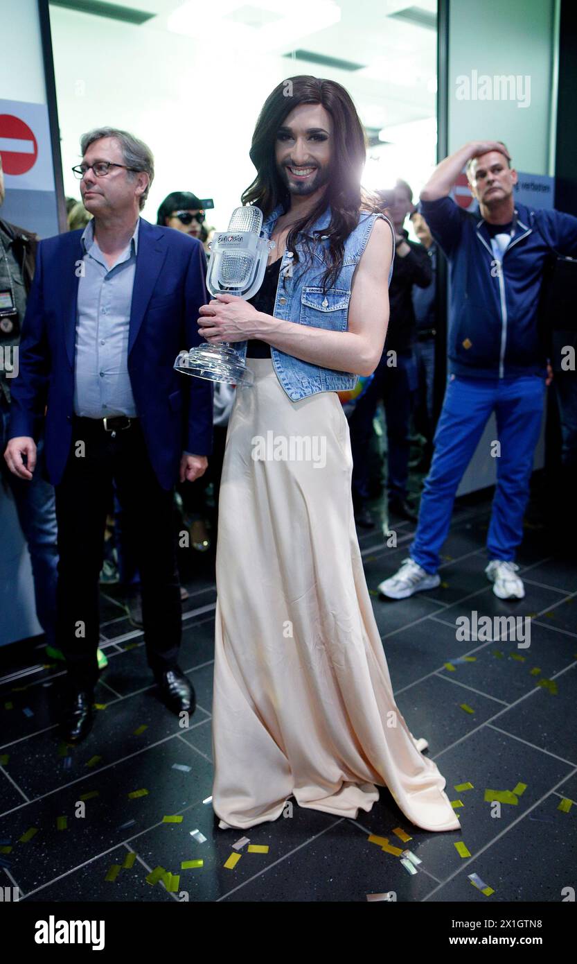 EuroVision Song Contest 2014 winner Conchita Wurst posing for the media after her arrival at Vienna Schwechat airport on 11 May 2014. - 20140510 PD6340 - Rechteinfo: Rights Managed (RM) Stock Photo