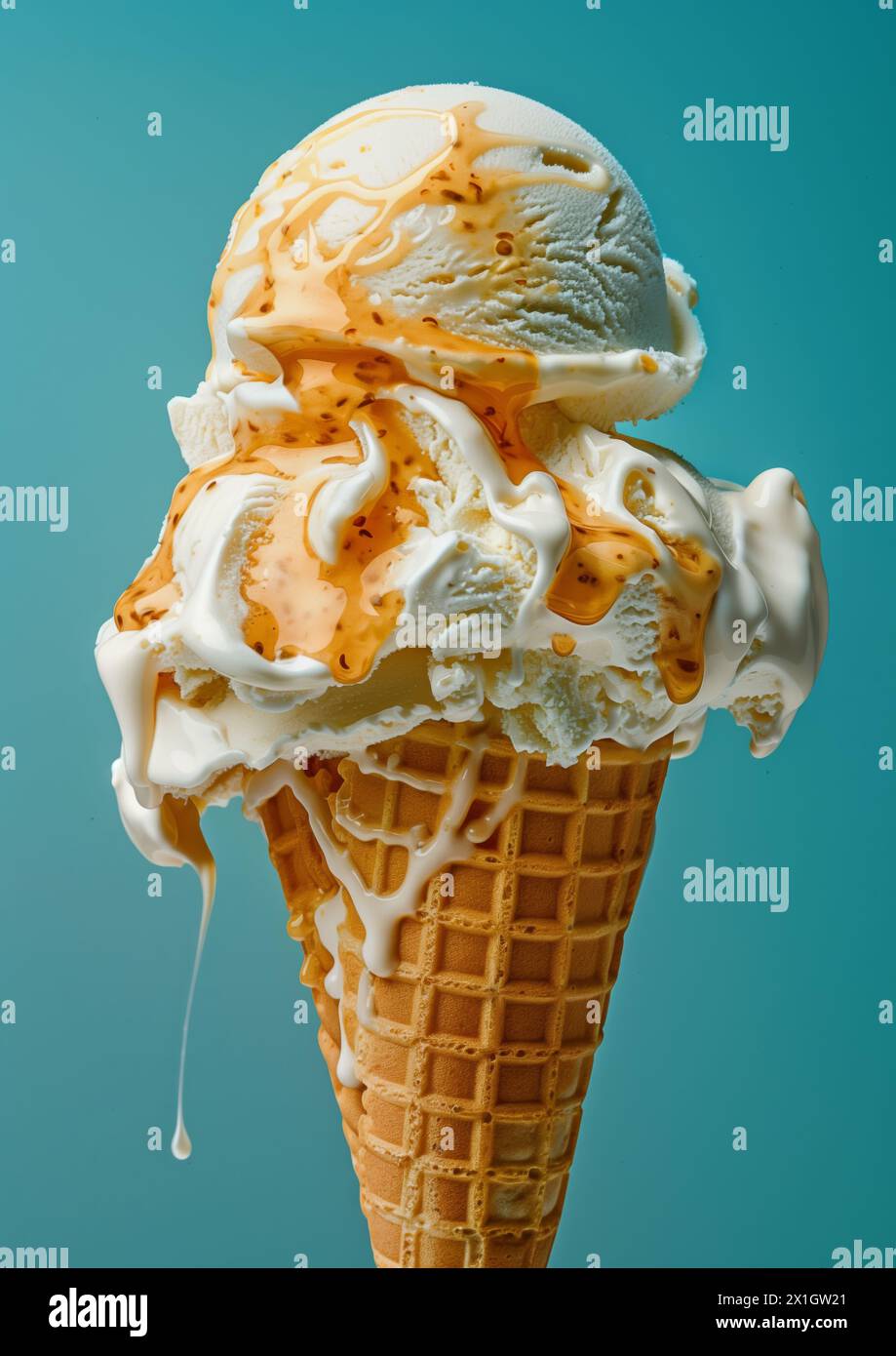 Two scoops of Vanilla ice cream on top ice cream cone blue background ...
