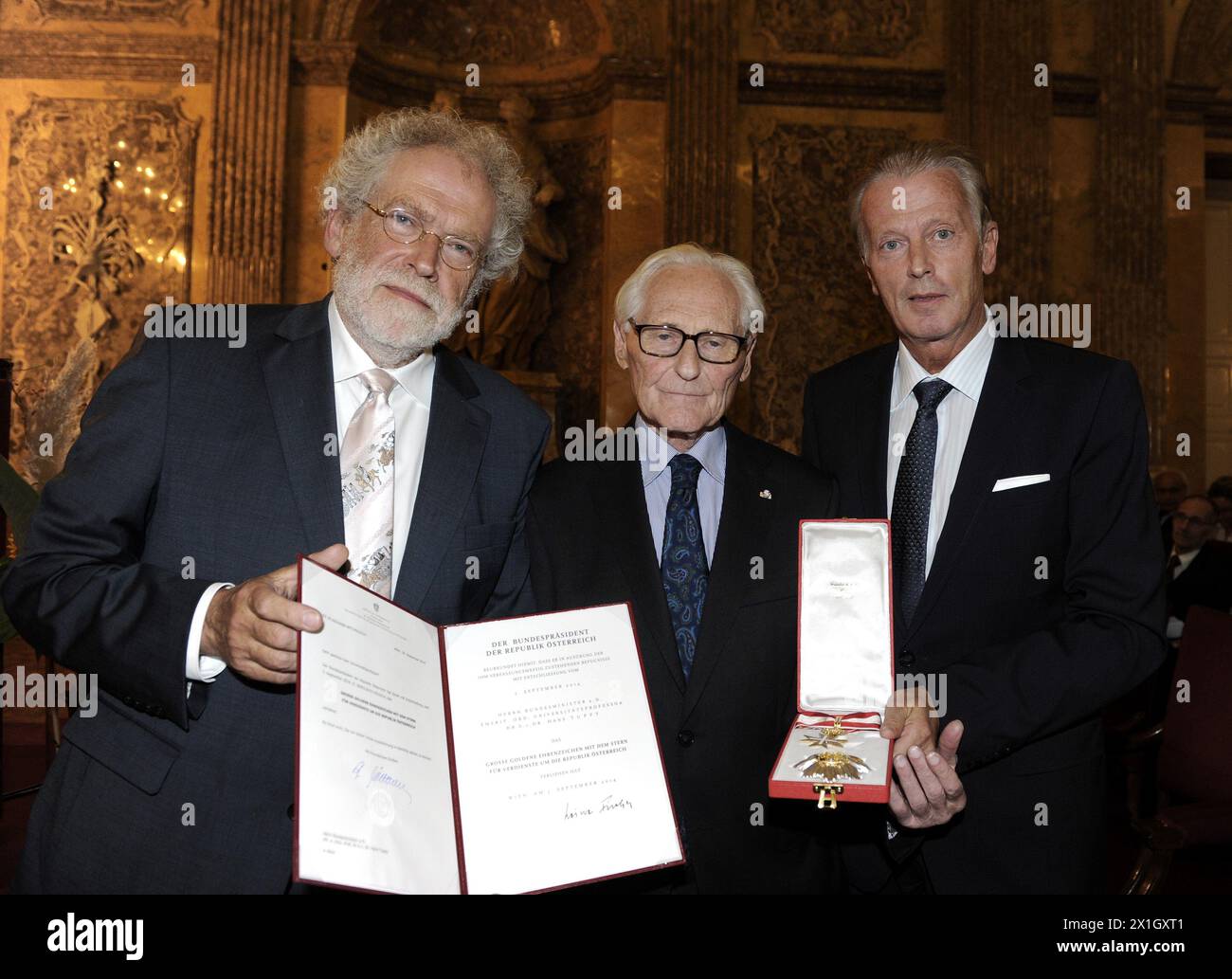 Biochemist and former Austrian Minister for Science and Research (1987-1989) Hans Tuppy received the 'Austrian Cross of Honour' in Vienna, Austria on 22 September 2014. In the picture: Anton Zeilinger, Hans Tuppy and Reinhold Mitterlehner. - 20140922 PD3284 - Rechteinfo: Rights Managed (RM) Stock Photo