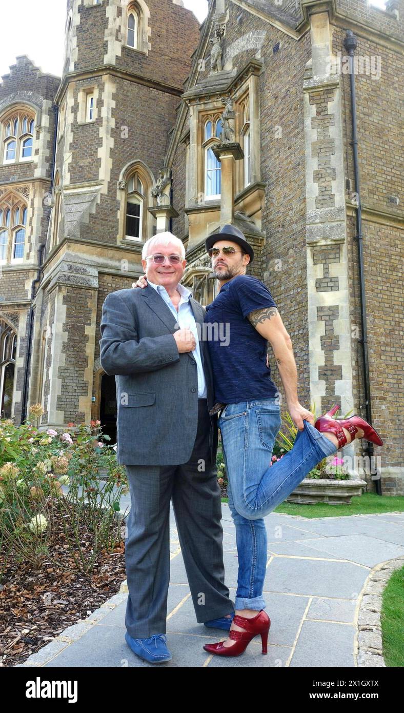 British actor Christopher Biggins and Rob Fowler pose in front of Oakley Court in Berkshire where the film 'Rocky Horror Picture Show' has been filmed, photographed on 02 October 2014. From 19 November until 14 December 2014 the musical 'Rocky Horror Show' will be displayed in Vienna. - 20141002_PD16311 - Rechteinfo: Rights Managed (RM) Stock Photo