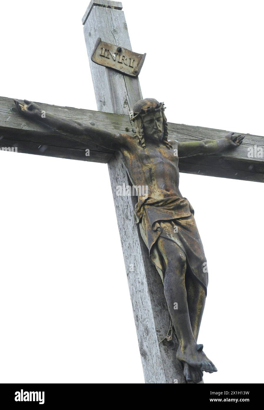 Feature - Easter - Good Friday - Good Friday is a Christian religious holiday commemorating the crucifixion of Jesus Christ and his death at Calvary. Picture taken on 30th March 2015. PICTURE:  grave with crucifix in Königstetten - 20150330 PD1206 - Rechteinfo: Rights Managed (RM) Stock Photo