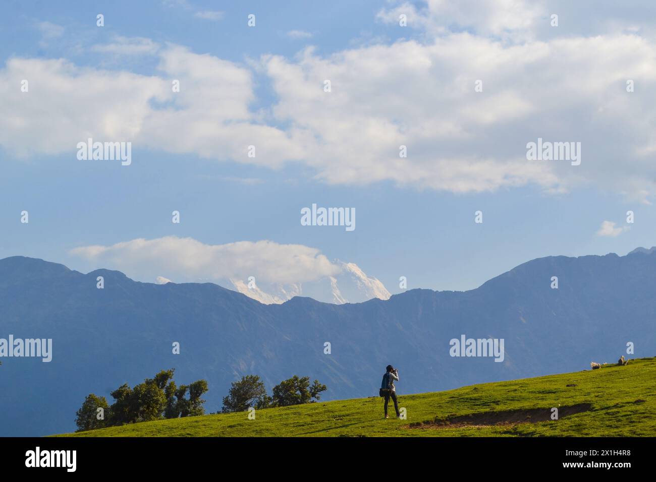 Boy capturing mountains Stock Photo