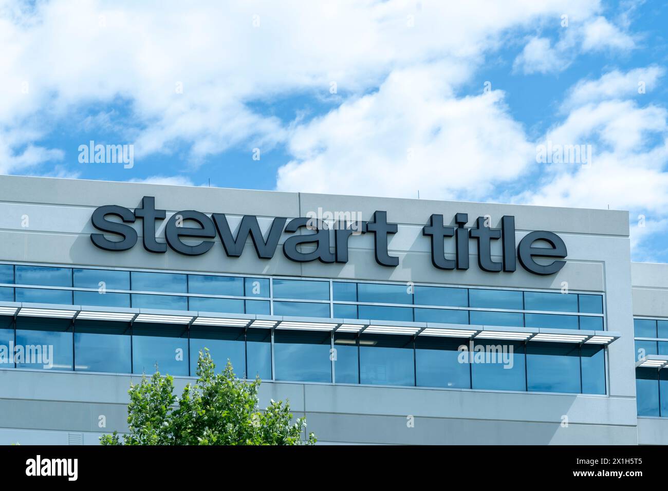 Houston, Texas, USA April 13, 2024 Stewart Title sign on the office building in Houston