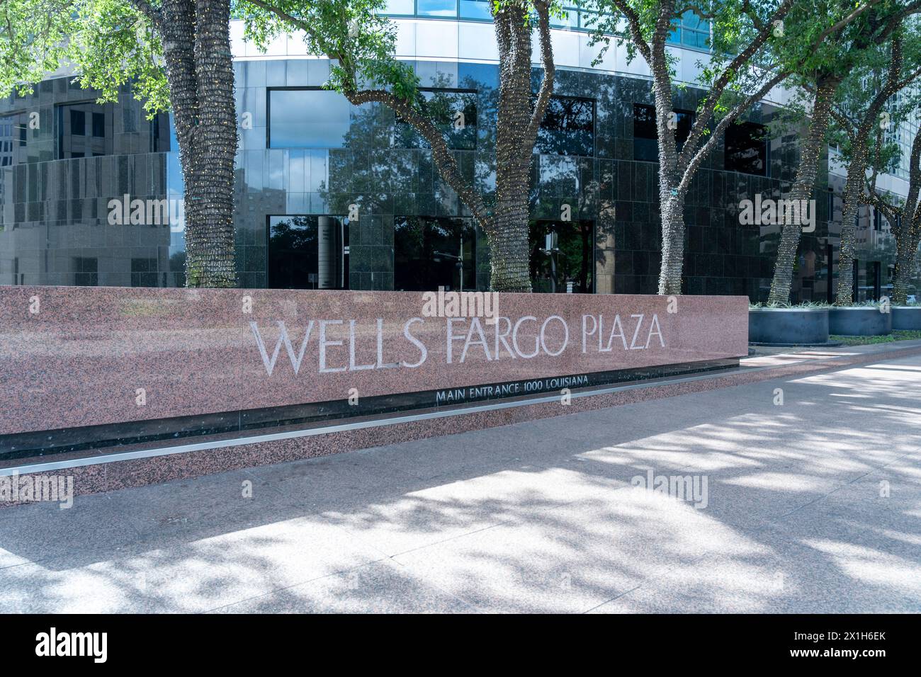 Wells Fargo Plaza ground sign in Houston, Texas, USA. The Wells Fargo Plaza is a high-rise skyscraper. Stock Photo