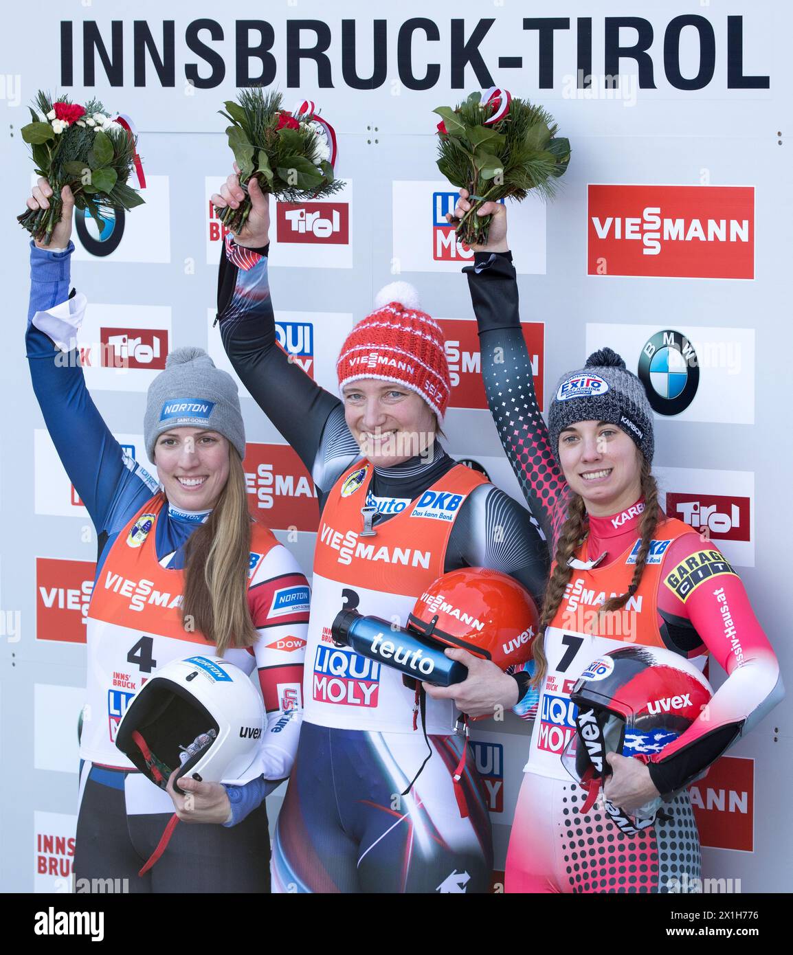 (L-R) Erin Hamlin of the USA, Tatjana Huefner of Germany and Kimberley McRae of Canada pose for a picture during the flower ceremony of the Women's Luge competition during the second day of the FILWorld Championships at Olympiabobbahn Igls on January 28, 2017 in Innsbruck, Austria - 20170128 PD2149 - Rechteinfo: Rights Managed (RM) Stock Photo