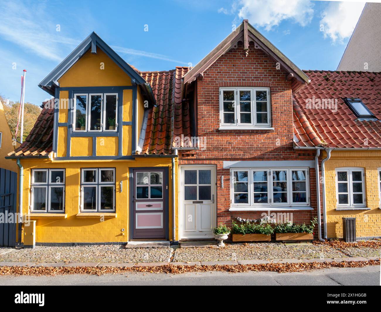 Charming historic old houses along Kirkestraede in old town of Bogense, Funen, Denmark Stock Photo