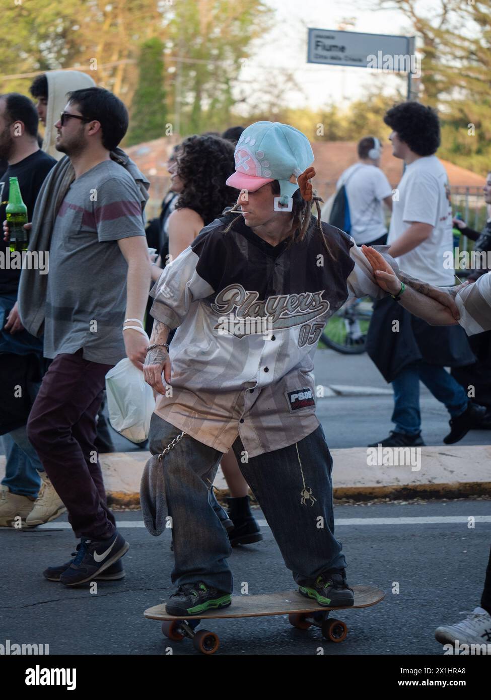 Boy with Funny Hat and Rasta Hair and with Joint Playing with his ...