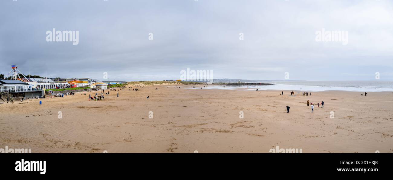 Family day out on the beach front in Portchcawl South Wales UK Stock Photo