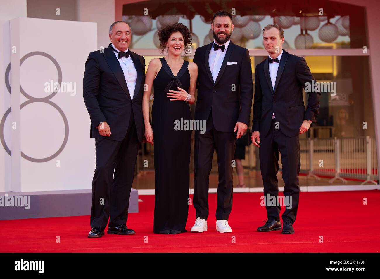 Copyright: Starpix/Alexander TUMA, 09.09.2021 Venice, Italy,  Oleksandr Rodnjans'kyj, Ksenija Aleksandrovna Rappoport, Vladimir Bitokov and Jurij Borisov , Premiere zu'America Latina' , 78th Venice International Film Festival 2021 - 20210909 PD12440 - Rechteinfo: Rights Managed (RM) Stock Photo