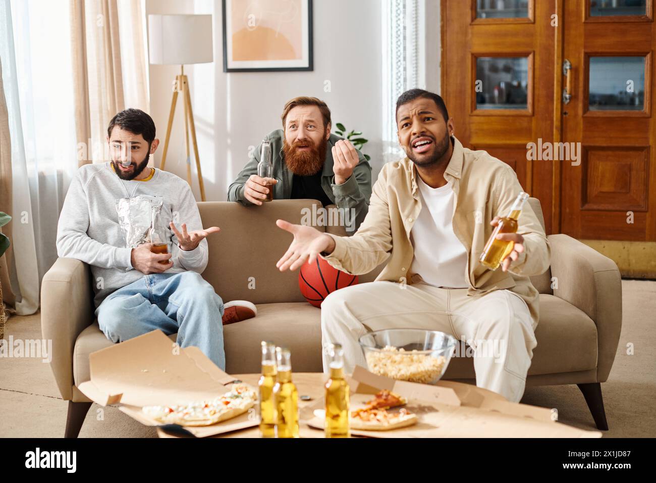 Three handsome, cheerful men of different races in casual attire bond ...