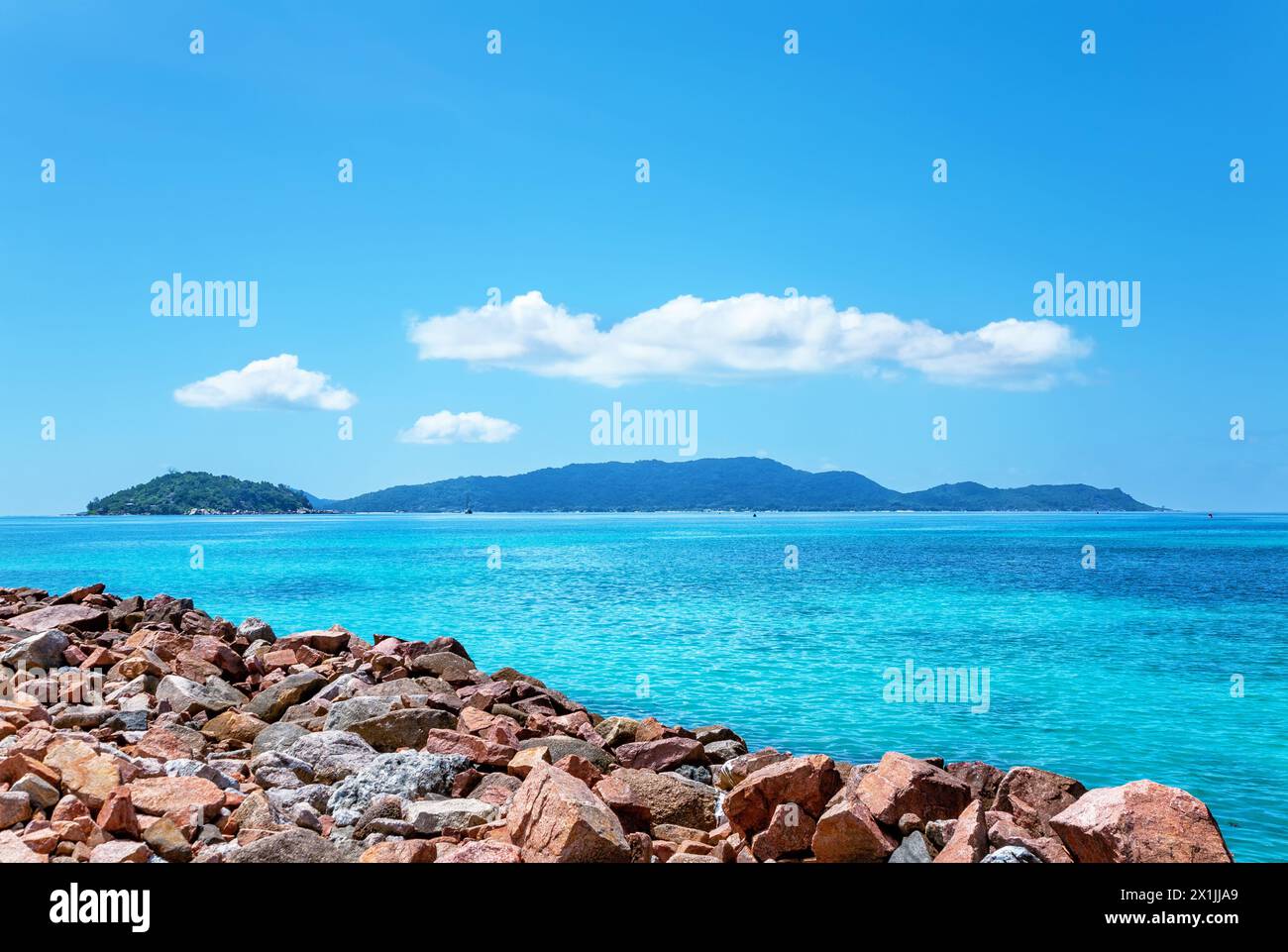 Island Ile Ronde on the left, Island Praslin in the background, seen from Island La Digue. Stock Photo