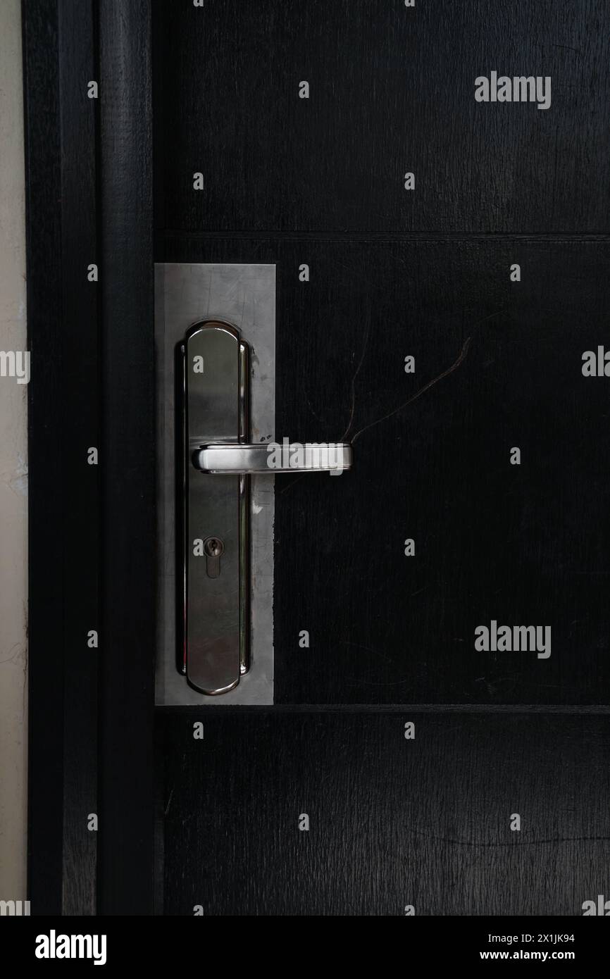 heavy duty door handle in hotel Stock Photo