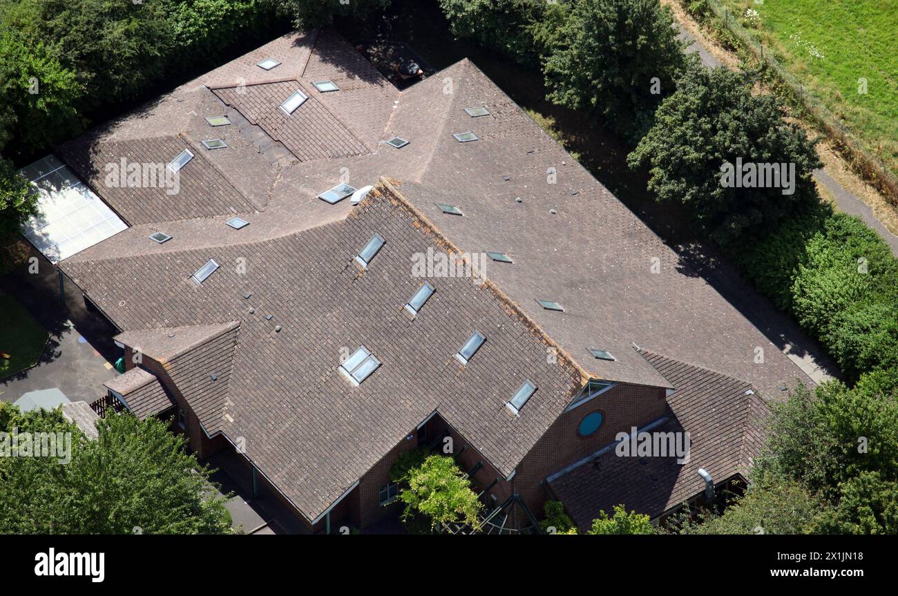 aerial view of a large roof with Velux and roof light windows, UK Stock Photo