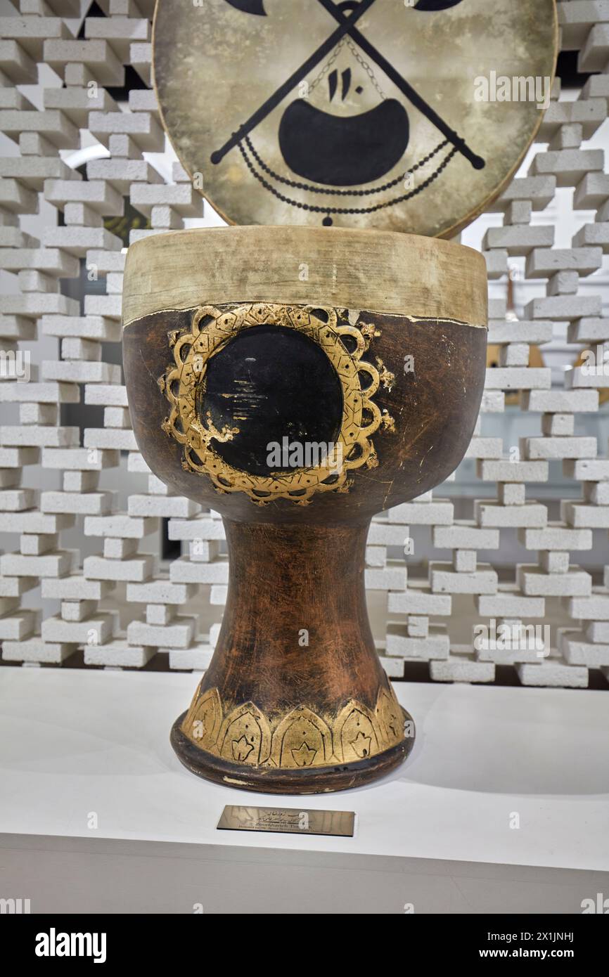 Persian tombak, a single-headed goblet drum, principal percussion instrument of Persian music, displayed in the Isfahan Music Museum. Isfahan, Iran. Stock Photo