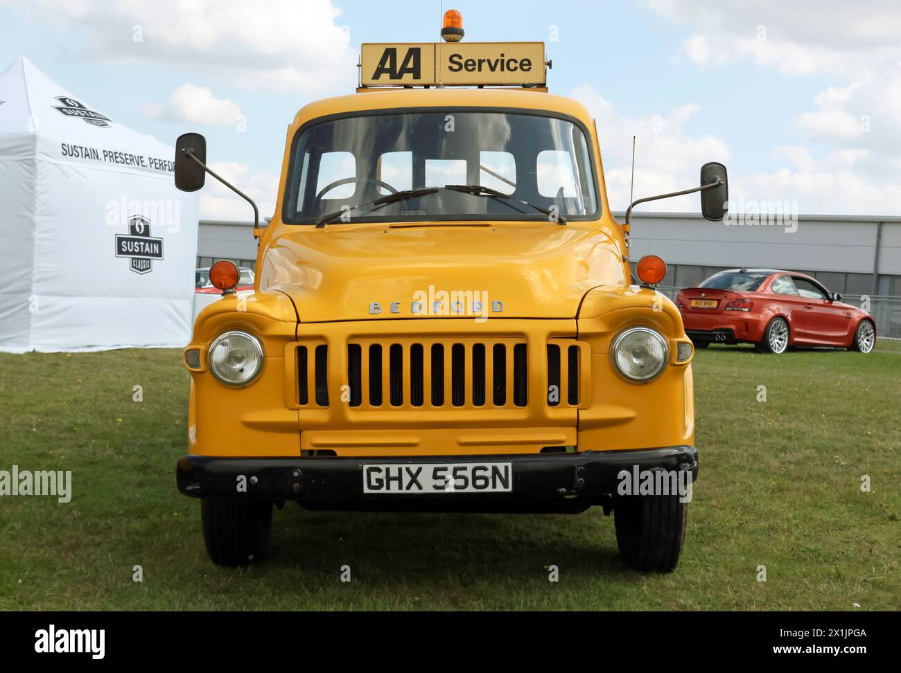 Front view of a Yellow, 1974 Bedford TJ J3,  Recovery Truck, part of the AA Heritage Fleet, on display at the 2023 British Motor Show Stock Photo