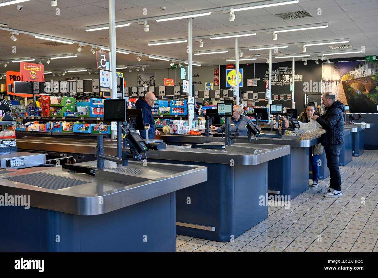 Row of checkout counters in Lidl supermarket Stock Photo