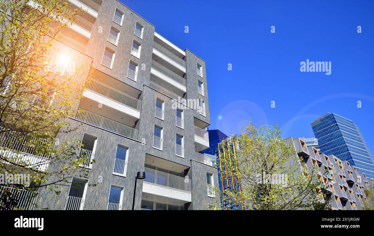 Image showcasing Eco architecture. Green tree and new residential building. Harmony of ...