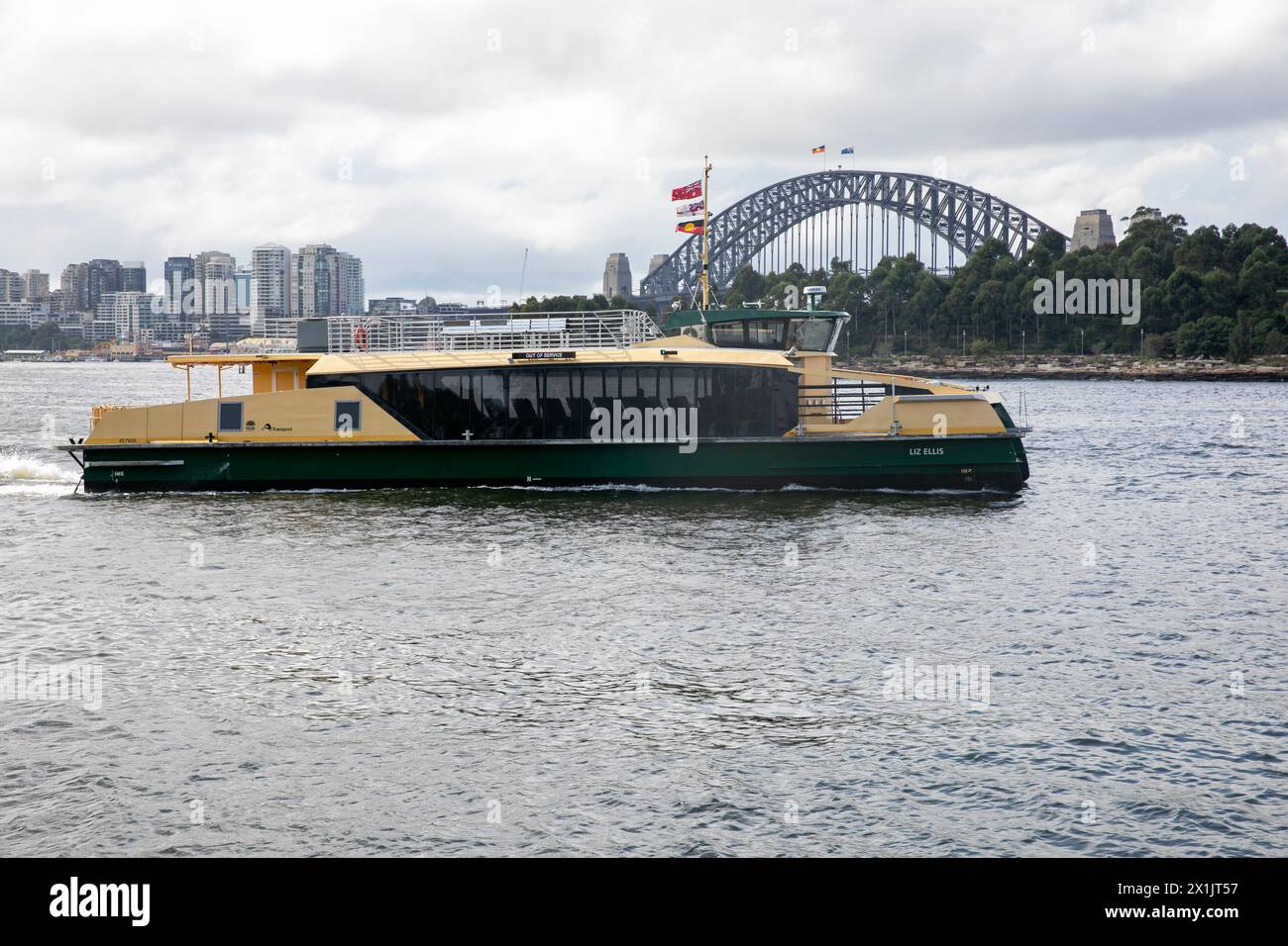 Sydney ferries the MV Liz Ellis, a river class ferry, travelling past Sydney Harbour Bridge on route to Darling Harbour and Barangaroo ferry wharves Stock Photo