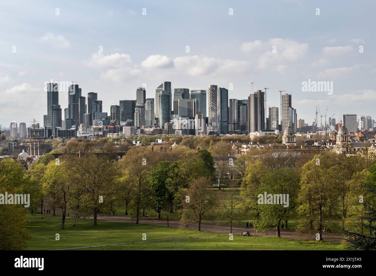 The financial and business district of Canary Wharf  in London Docklands, London, UK, seen from Greenwich Park across the River Thames Stock Photo