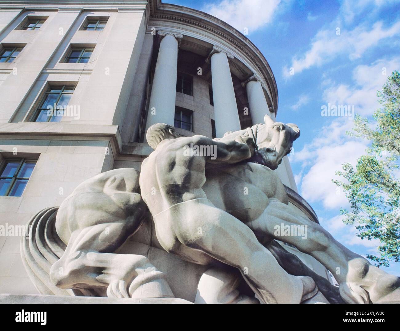 Federal Trade Commission Building (Apex Building) in Washington DC USA. Man Controlling Trade sculpture by Michael Lantz Stock Photo