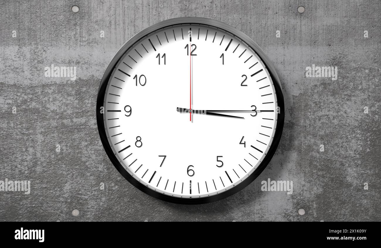 Time at quarter past 3 o clock classic analog clock on rough concrete