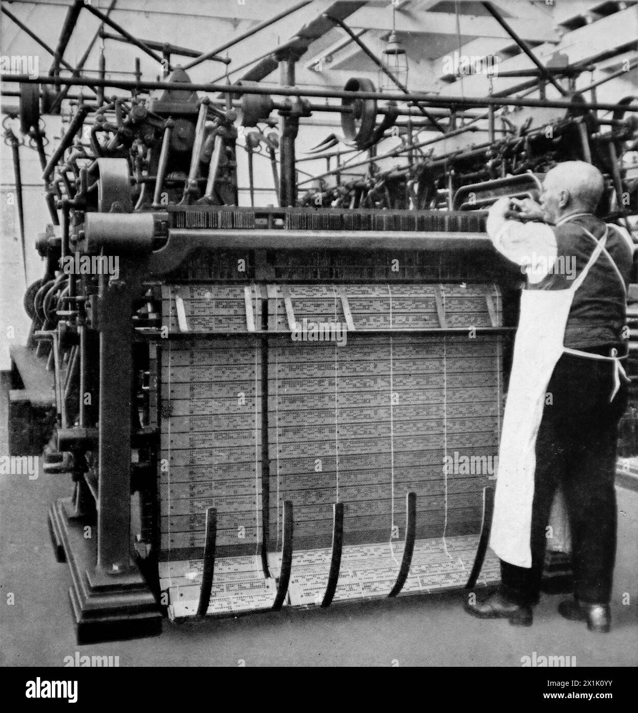 The Jacquard, the thread-controlling mechanism. This was published in 1924 by The Federation of Lace and Embroidery Employers’ Associations, Nottingham, for the British Empire Exhibition. Stock Photo